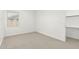 Cozy bedroom featuring carpet, natural light and a closet at 4051 S Galaxy Ln, Mesa, AZ 85212