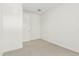 Small bedroom showcasing neutral carpet and a white door at 4051 S Galaxy Ln, Mesa, AZ 85212