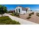 Attractive single-story home featuring brown tile roof and low maintenance landscaping at 4051 S Galaxy Ln, Mesa, AZ 85212