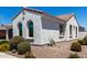 Attractive single-story home featuring brown tile roof and low maintenance landscaping at 4051 S Galaxy Ln, Mesa, AZ 85212