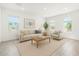 Bright living room with neutral tones, modern decor, and lots of natural light at 4051 S Galaxy Ln, Mesa, AZ 85212