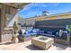 Cozy outdoor lounge area with comfortable seating and a modern fire pit at 4137 E Sells Dr, Phoenix, AZ 85018