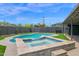 Beautiful backyard showcasing a private pool and spa, perfect for outdoor relaxation at 4137 E Sells Dr, Phoenix, AZ 85018