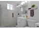 Modern bathroom with a glass-enclosed shower, stylish vanity, and contemporary fixtures at 4137 E Sells Dr, Phoenix, AZ 85018