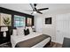 Cozy bedroom featuring a comfortable bed, stylish decor, and a relaxing ambiance at 4137 E Sells Dr, Phoenix, AZ 85018