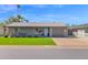 Charming single-story home with a well-manicured lawn and a welcoming entrance at 4137 E Sells Dr, Phoenix, AZ 85018