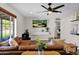 Inviting living room featuring a comfortable leather sectional sofa and modern decor at 4137 E Sells Dr, Phoenix, AZ 85018