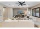 Spacious living room features tile floors, recessed lighting, and ceiling fan that creates an inviting atmosphere at 4141 E Morrison Ranch Pkwy, Gilbert, AZ 85296