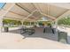 Shaded picnic area with tables, providing a comfortable space for outdoor gatherings and relaxation at 4141 E Morrison Ranch Pkwy, Gilbert, AZ 85296