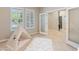 Versatile playroom with natural light, neutral walls, plantation shutters, and a cozy teepee at 4141 E Morrison Ranch Pkwy, Gilbert, AZ 85296