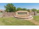Welcoming Elliot Groves community sign with stone accents and well-manicured landscaping at 4141 E Morrison Ranch Pkwy, Gilbert, AZ 85296