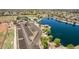Aerial view highlighting the park amenities and proximity to the parking area and water features at 41804 W Carlisle Ln, Maricopa, AZ 85138