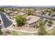 A high aerial perspective in a neighborhood with desert landscaping and tile roofed homes at 41804 W Carlisle Ln, Maricopa, AZ 85138