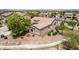 Aerial view of the home, beautifully landscaped with desert surroundings at 41804 W Carlisle Ln, Maricopa, AZ 85138