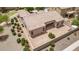 Back of single-Gathering home with a tile roof, desert landscaping and a privacy wall at 41804 W Carlisle Ln, Maricopa, AZ 85138
