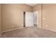Bedroom with carpeted floor and closet at 41804 W Carlisle Ln, Maricopa, AZ 85138