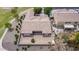 An aerial shot shows the property's neutral exterior, desert backyard, and adjacent neighbor at 41804 W Carlisle Ln, Maricopa, AZ 85138