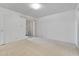 Bedroom with sliding glass doors and neutral carpeting at 420 W Yukon Dr # 4, Phoenix, AZ 85027