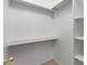 A bright walk-in closet with built in shelving at 420 W Yukon Dr # 4, Phoenix, AZ 85027