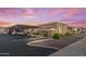 Low angle view of a home with a covered parking spot in a desert community at 420 W Yukon Dr # 4, Phoenix, AZ 85027