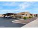Exterior view of a home with covered parking and desert landscaping at 420 W Yukon Dr # 4, Phoenix, AZ 85027