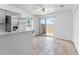 Kitchen with stainless steel refrigerator, breakfast bar, and patio access at 420 W Yukon Dr # 4, Phoenix, AZ 85027