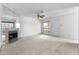 Inviting living room with mirrored wall, fireplace, and natural light at 420 W Yukon Dr # 4, Phoenix, AZ 85027
