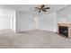 Bright living room featuring a fireplace and tile flooring at 420 W Yukon Dr # 4, Phoenix, AZ 85027