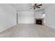 Spacious living room with a fireplace and ceiling fan at 420 W Yukon Dr # 4, Phoenix, AZ 85027