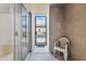 Covered patio with chair and security gate for added safety at 420 W Yukon Dr # 4, Phoenix, AZ 85027