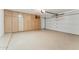 Garage includes built-in cabinets for storage and an epoxy floor for durability at 4202 E Brookwood Ct, Phoenix, AZ 85048