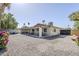 Sprawling backyard with gravel landscaping and extended patio at 4240 E Bluefield Ave, Phoenix, AZ 85032