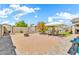 Spacious backyard with desert landscaping, brick pavers and a gazebo area at 4396 E Austin Ln, San Tan Valley, AZ 85140