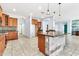 Open kitchen featuring tiled floors, breakfast bar and lots of cabinet space at 4396 E Austin Ln, San Tan Valley, AZ 85140
