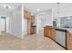 Bright kitchen featuring stainless steel appliances, tiled floors, and wood cabinetry at 4396 E Austin Ln, San Tan Valley, AZ 85140