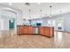 Open kitchen with stainless steel dishwasher and ample cabinet space and granite countertops at 4396 E Austin Ln, San Tan Valley, AZ 85140