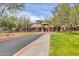 Beautifully landscaped clubhouse exterior with well-maintained grounds and easy access parking at 4408 W Heyerdahl Dr, New River, AZ 85087
