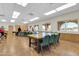 Large activity room with rows of tables and seating, offering ample space for hobbies and group gatherings at 515 S Parkcrest -- # 531, Mesa, AZ 85206