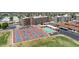 An aerial view of community amenities including pickleball courts and pool at 515 S Parkcrest -- # 531, Mesa, AZ 85206