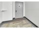 Entryway with neutral decor and carpet that matches the gray painted door at 515 S Parkcrest -- # 531, Mesa, AZ 85206