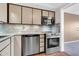 Galley-style kitchen featuring stainless steel appliances at 515 S Parkcrest -- # 531, Mesa, AZ 85206