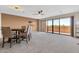 Bright open floor plan with living room, dining area and large sliding glass doors to balcony at 515 S Parkcrest -- # 531, Mesa, AZ 85206