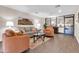 Cozy community living room featuring plush seating, lamps, and a view of mountains at 515 S Parkcrest -- # 531, Mesa, AZ 85206