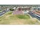 Aerial view of community tennis courts, swimming pool and common area at 515 S Parkcrest -- # 531, Mesa, AZ 85206