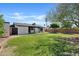 Manicured backyard with lush green grass and privacy landscaping at 540 W La Donna Dr, Tempe, AZ 85283