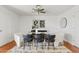 Elegant dining room with modern furnishings, a decorative rug, and ample natural light at 540 W La Donna Dr, Tempe, AZ 85283