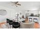 Open dining area features modern furniture, adjacent to the updated kitchen with stainless steel appliances at 540 W La Donna Dr, Tempe, AZ 85283