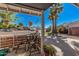 Cozy front porch seating area provides a relaxing view of the street and neighborhood at 5624 W Villa Theresa Dr, Glendale, AZ 85308