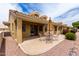 Outdoor patio with a seating area and well-maintained landscaping, perfect for enjoying the weather at 5830 E Mckellips Rd # 101, Mesa, AZ 85215