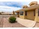 Charming back patio featuring a seating area with scenic views of the well maintained backyard at 5830 E Mckellips Rd # 101, Mesa, AZ 85215
